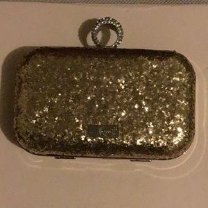 Gold sparkles clutch